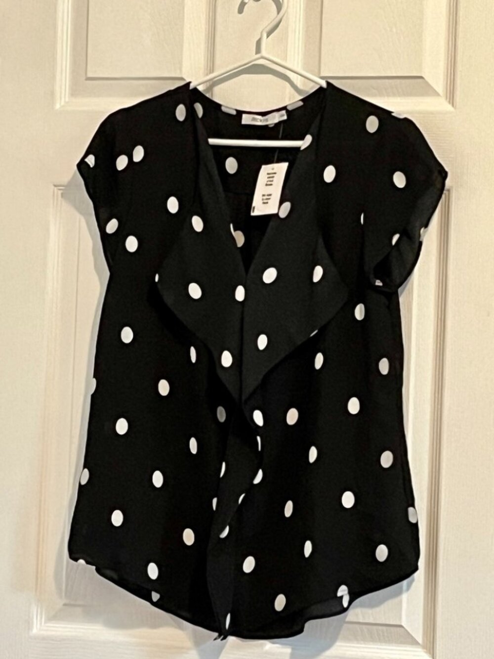 Ricki's medium black with white polka dot blouse